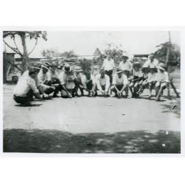 Playing marbles on Christmas Day 1935 at the Aitken home, 14 Taylor Street Belgian Gardens, Townsville