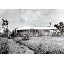 A house damaged by Cyclone Leonta, Townsville, 1903