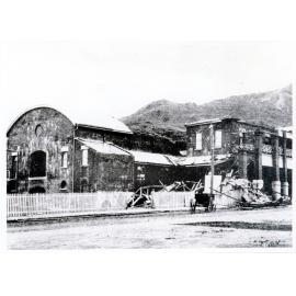 The School of Arts building, corner of stanley and Walker Streets after Cyclone Leonta, 1903