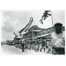 Armistice Day parade featuring Japanese citizens, Flinders Street, Townsville City, Townsville, 11 November 1918
