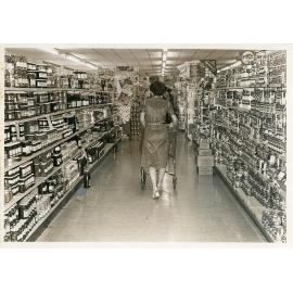 Customer at Philip Leong's Hermit Park store, Townsville, 1950s
