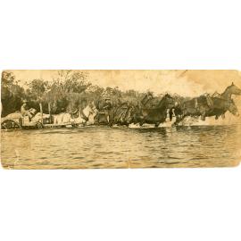 Jim and Bill Neilsen crossing the Burdekin River near Ravenswood with supplies, 1897