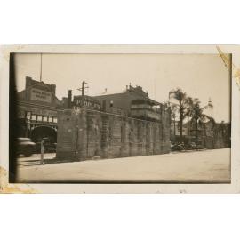 Demolition of an an air raid shelter, Flinders Street, Townsville, August 1945