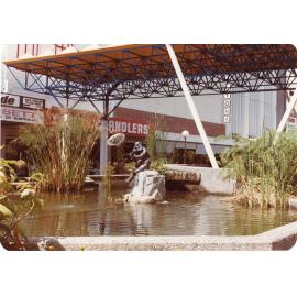 Benjamin, a cast bronze sculpture by Brian Engris in the fountain in Flinders Mall, Townsville