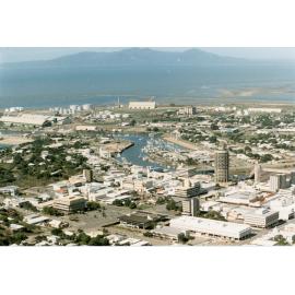 Aerial view of the Townsville city area, looking toward the harbour, Townsville, 1986