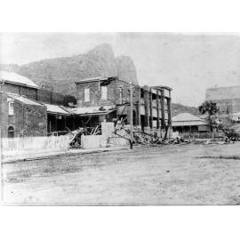 The School of Arts building, corner of Stanley and Walker streets, after Cyclone Leonta, 1903