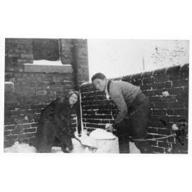 Vincent Parker shovelling snow in England. 