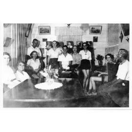 Vincent Parker with family and friends inside Purono railway siding building. 