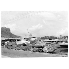 Boats washed ashore on Palmer Street during Cyclone Althea. 