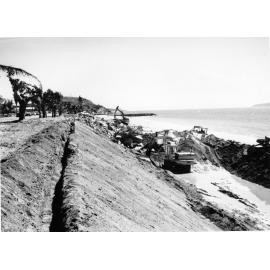 Restoration work on the Strand beach after Cyclone Althea. 