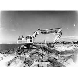 Reconstruction of the Coral Sea Memorial Rockpool, Kissing Point, after damage caused by Cyclone Althea. 