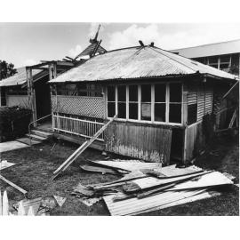 Scully residence being dismantled, Blackwood Street, Townsville, 12 December 1977