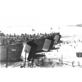 Landing barges at the Townsville Strand, circa 1942