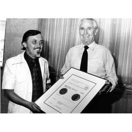 Townsville Mayor, Perc Tucker, receiving an architectural award for the new Townsville City Council administration building. 