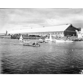 Magnetic Island to Townsville swim. Competitors J. Koorey and Paul Lacey fighting it out for third place in the 1966 swim. 