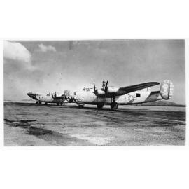 [Two B24 Liberators and one C46 Curtiss Commando, RAAF Base Garbutt, Townsville, 1944]. 