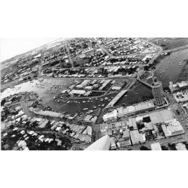Aerial view of Ross Creek and the Townsville City, Townsville, 1976