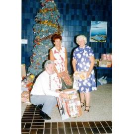 Townsville Mayor, Alderman Mike Reynolds, distributing gifts from the Mayor's Christmas Tree appeal. 