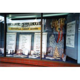 Townsville Public Library display in NORQEB building window, Stokes Street, Townsville, ca 1990