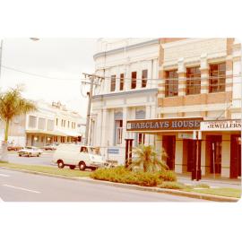 Flinders Street frontage of the National Mutual Building and Samuel Allen and Sons buildings, Townsville, 1980