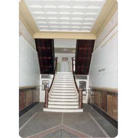 Entry foyer and staircase leading to the second storey in the Town Hall building, Flinders Street, Townsville, 1978