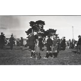 Jeffery collection : Boys watching a brass band performance, Townsville