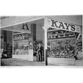 Mr. Kay, in front of Kay's Cash Boot Store, Townsville. 