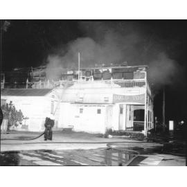 Firemen at the scene of the Rising Sun Hotel fire, Townsville, 19 October 1968 
