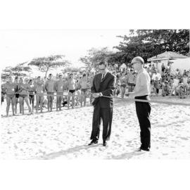 The Mayor, Alderman Angus Smith, cuts the ribbon at the official opening of the Pallarenda Baths, 5th November 1966. 