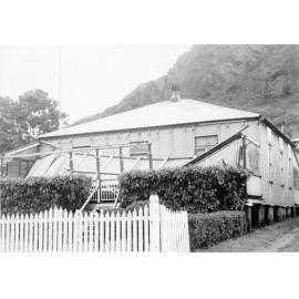 Cyclone damage to a house in Paxton Street, North Ward 
