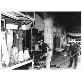 Fire damage to Tassell's Silk Store, from the Austral Cafe fire, Market Reserve Building, Flinders Street, Townsville. 