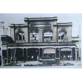 Fire damage to the Cummins and Campbell building, Flinders Street, Townsville, 1927