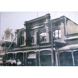 [Fire damage to the Cummins and Campbell building, Flinders Street, Townsville, late 1920's.] 