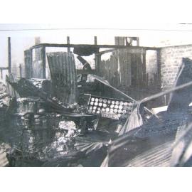 [Fire damage at the Cummins and Campbell building, Townsville, late 1920's.] 