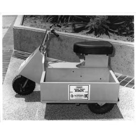 The NORQEB battery electric scout scooter on display at the Townsville City Council administration building, circa 1979