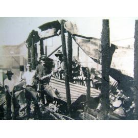 Fire damage to the Cummins and Campbell building, Flinders Street, Townsville, late 1920's