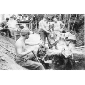 Mount Spec Road, servicemen building ramp to unload generator, 1942 