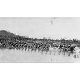 Black School Weir construction, during flood, ca 1934 