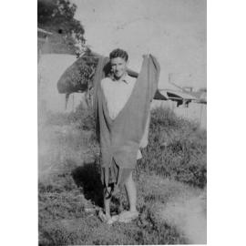 Jim Patterson, with overalls, ca 1940 