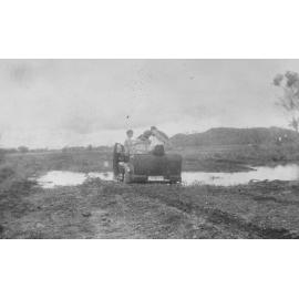 People in utility bogged 5 miles outside of Cloncurry, ca 1940 