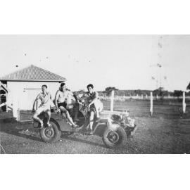 Jack Woodward, Locke and Adrian Shepherd sitting on jeep, ca 1940 