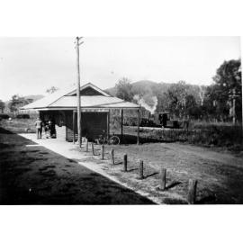 Camila cane station with cane team in background, n.d. 