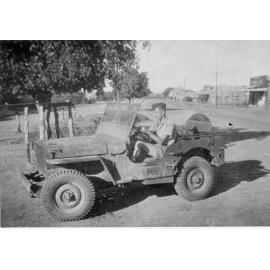 Jack Woodward with borrowed U.S.A jeep, ca 1940 