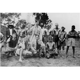 Jack Woodward and Gamblin' Wes with a group of Aborigines, ca 1940 