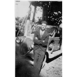 Dick Kelso leaning on a car, Greenbower, 1936 