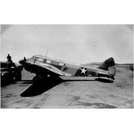 Aircraft "Oxford", with truck on airfield, ca 1940 