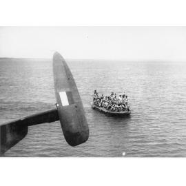 Passengers boarding Catalina aircraft from scow at Melville Bay, ca 1940 