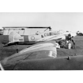 Aicraft, "Arvo Anson", being repaired on airfield, ca 1940 