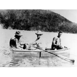 Doug Withnall with Eric, Ernie and Dick Kelso, in row boat near Whitsundays, ca 1937 