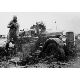 Jack Smith kangaroo shooting with Rugby Ford in background, Kalandra, ca 1935 
